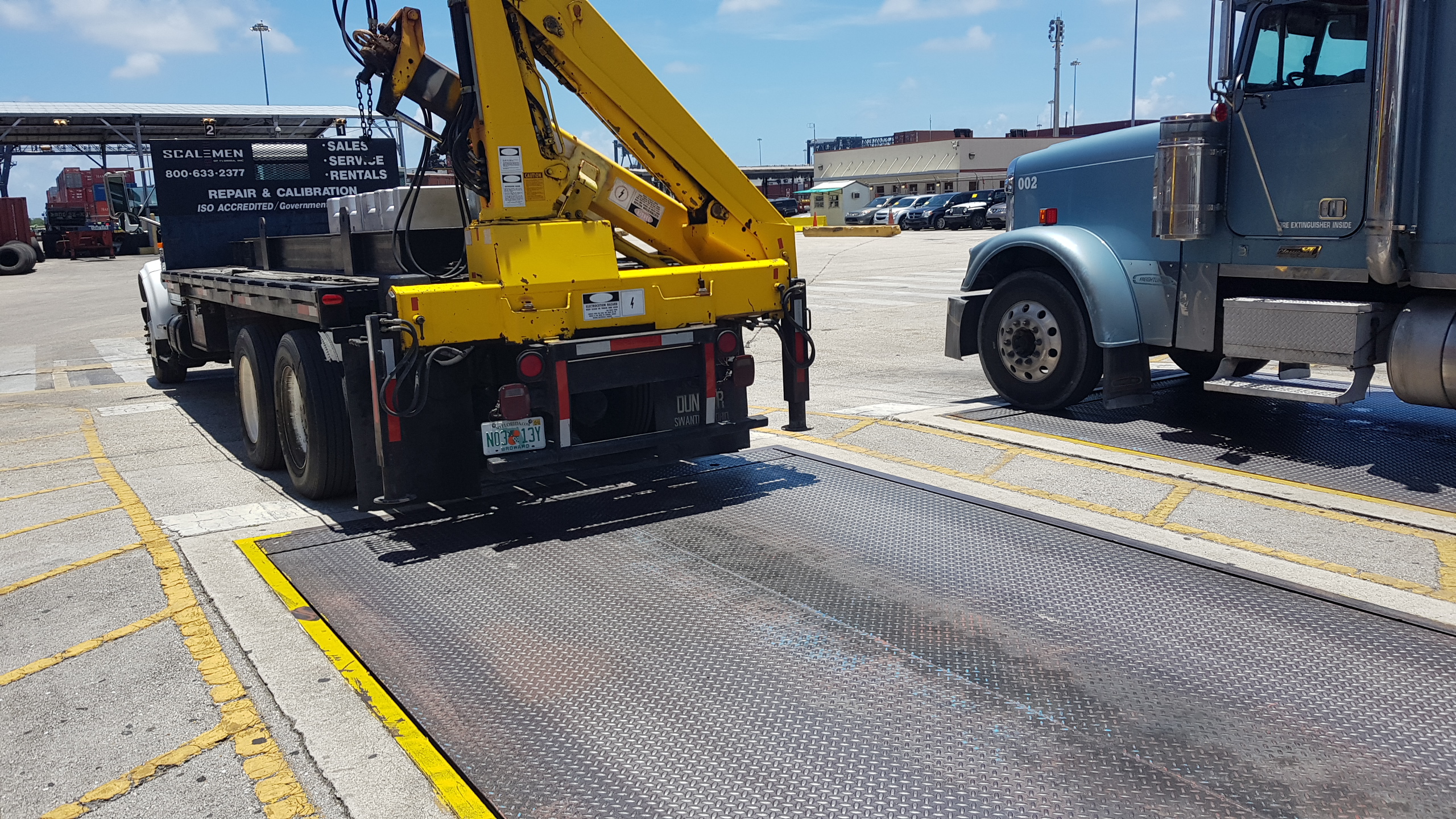 Test truck servicing a truck scale